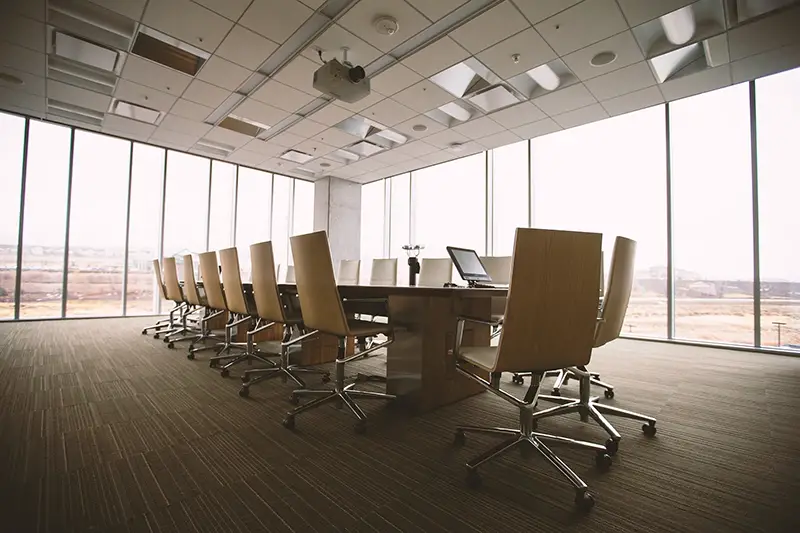 Conference room with glass window and wooden floor