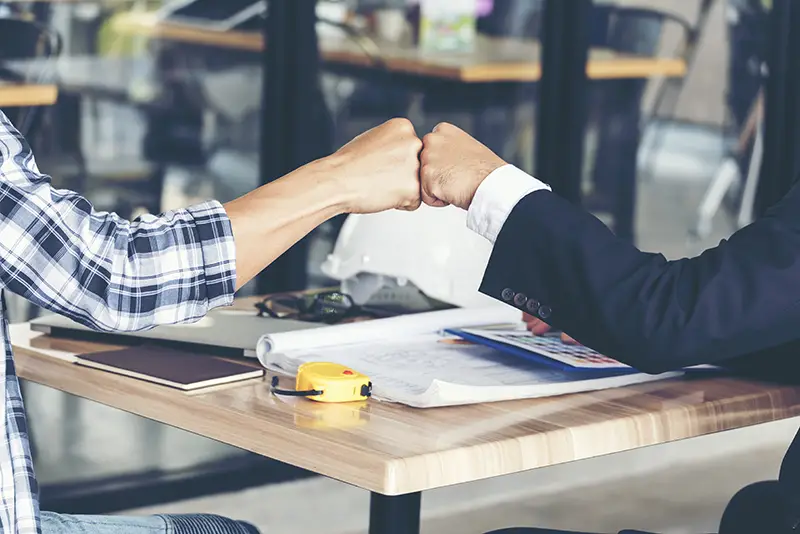 People Fist bump Hands together