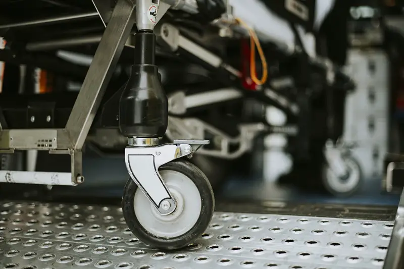 Closeup of ambulance stretcher wheel on swivel caster