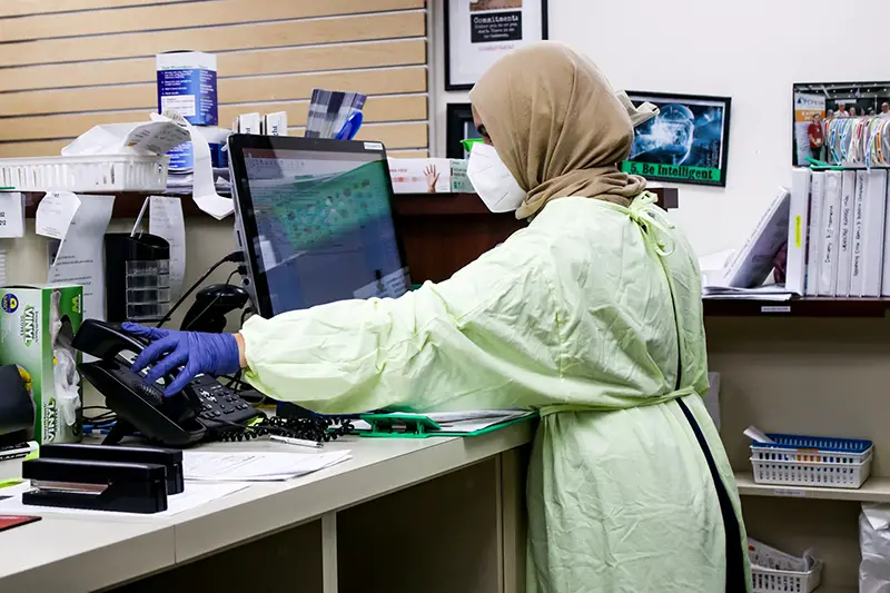 employees wearing PPE during covid pandemic