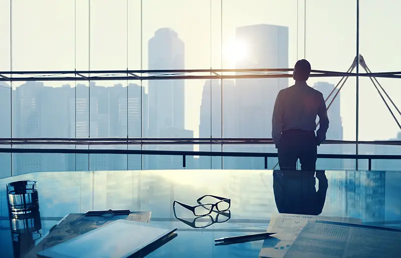 Businessman in a big office