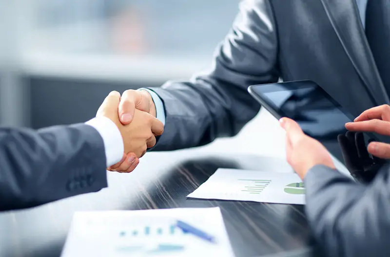 Man in business suit doing the handshake