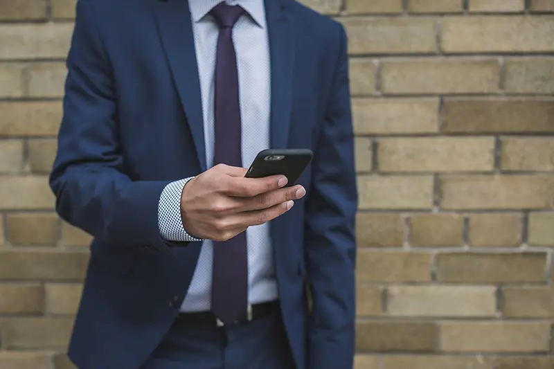 Businessman using his smartphone