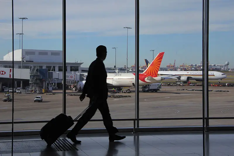 Silhouette person rushing in the airport terminal