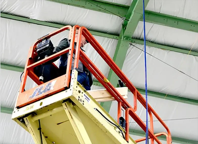 Man operating forklift