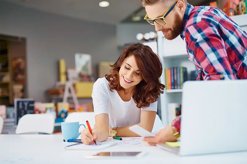 Designers working on new project in modern office