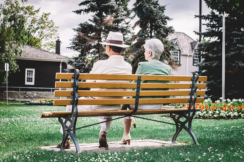 Old couple sitting on the bench