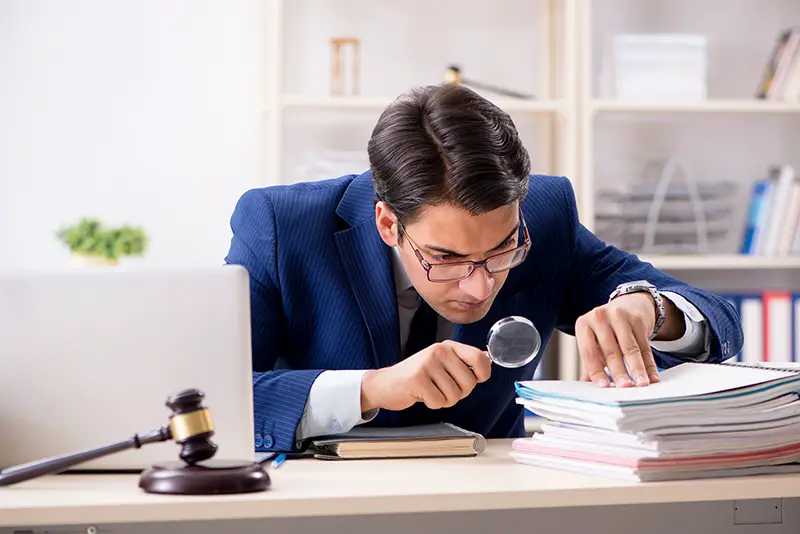 Young handsome judge working in court