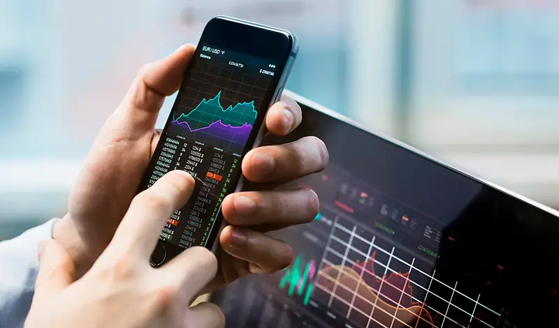 Man holding black phone