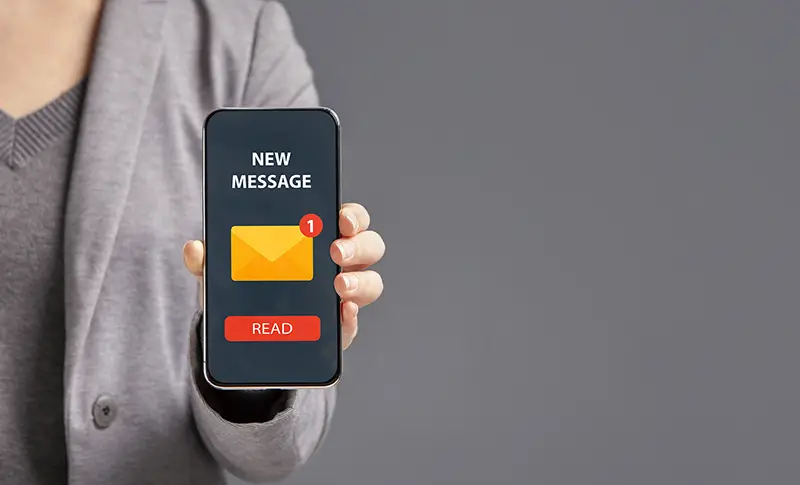 Businesswoman Showing Smartphone With New Message Notification, Envelop Icon And Read Button