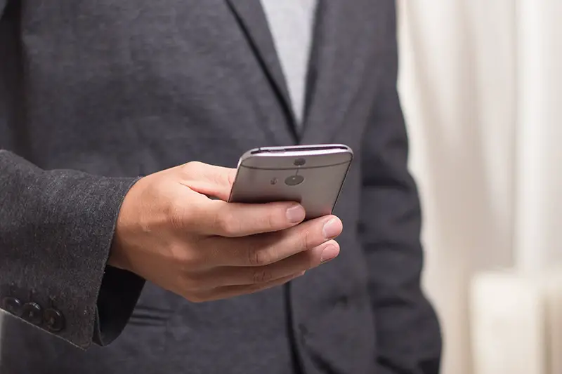 Businessman using mobile phone