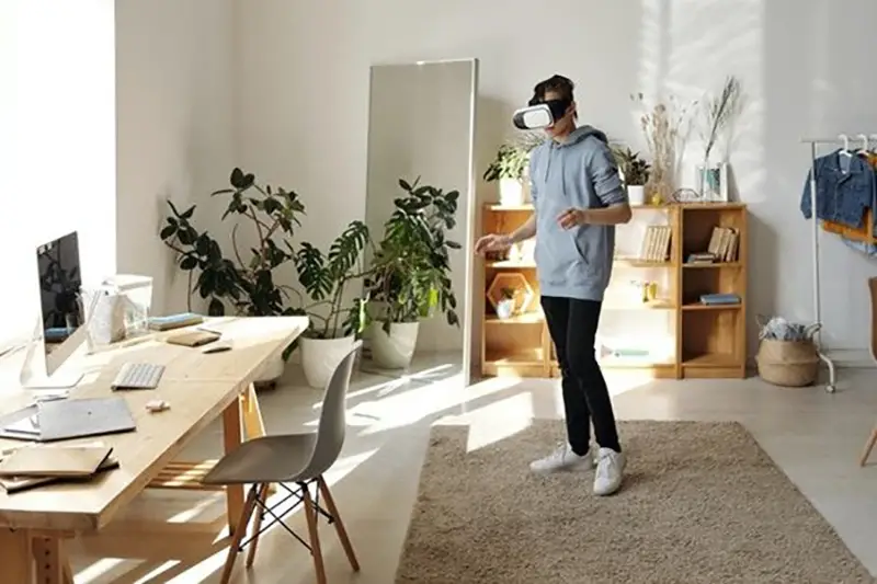 Young man wearing AR device