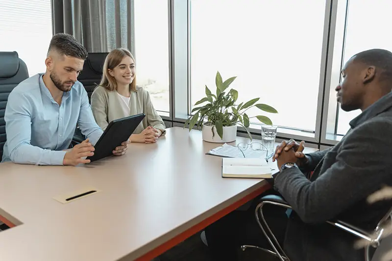 Man and woman conduction an interview