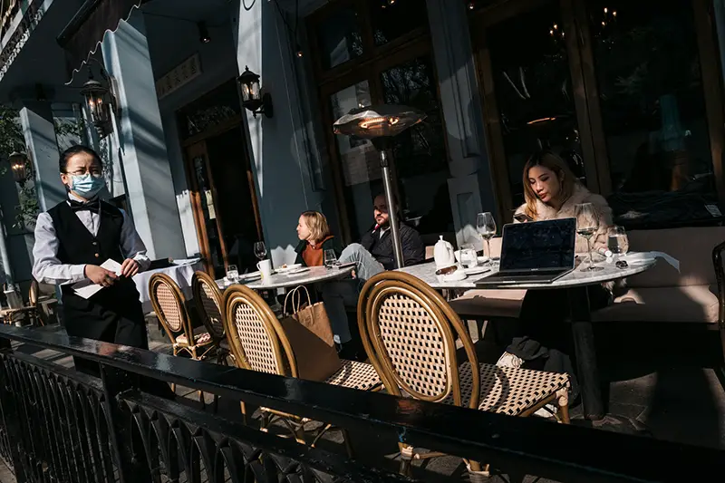 Man and woman sitting on chair in the restaurant