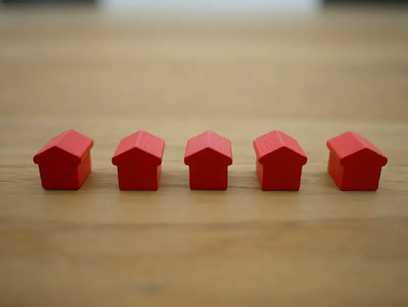 Red blocks on brown wooden table