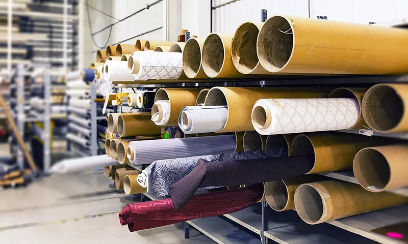 rolls of material in a fabric factory