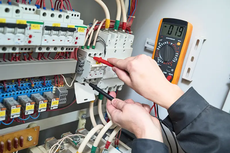 electrician measurements with multimeter tester