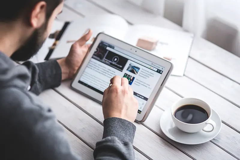 Man reading touch screen