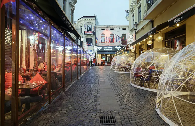 Restaurant with colorful lights on the city