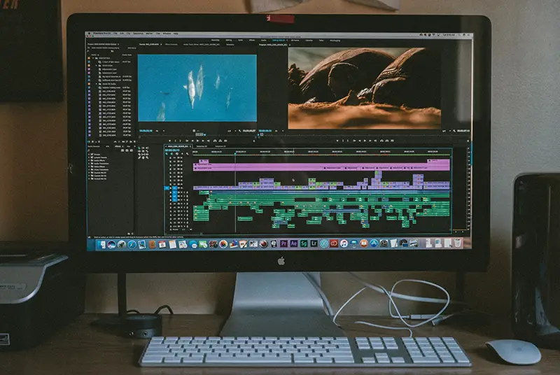 Audio editing software on black iMac computer