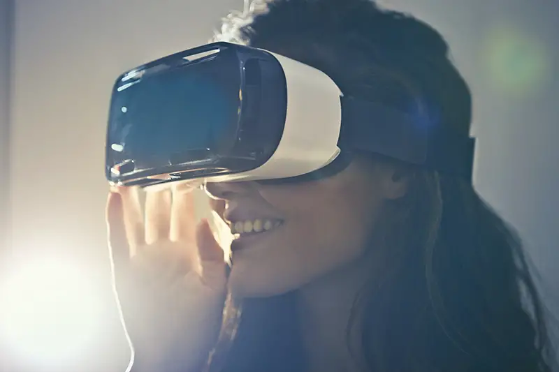 Woman wearing white virtual reality