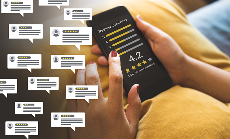 Consumer reviews concepts with bubble people review comments and smartphone. 