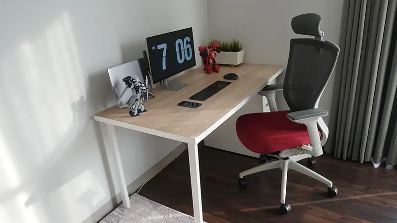 desk and chair with casters set up for working from home