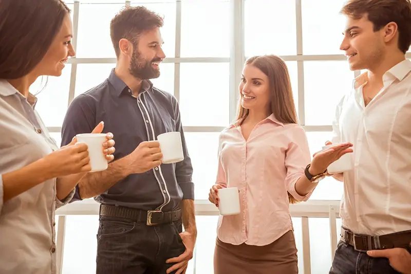 Office workmates having coffee break