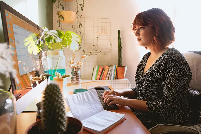 Woman using iMac