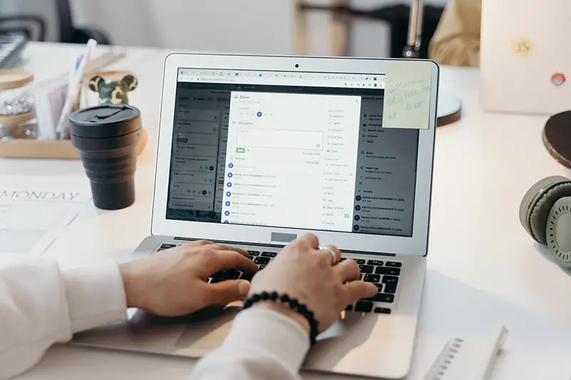 Person using a laptop on the table