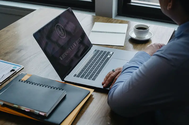 Attorney sitting in front of his laptop