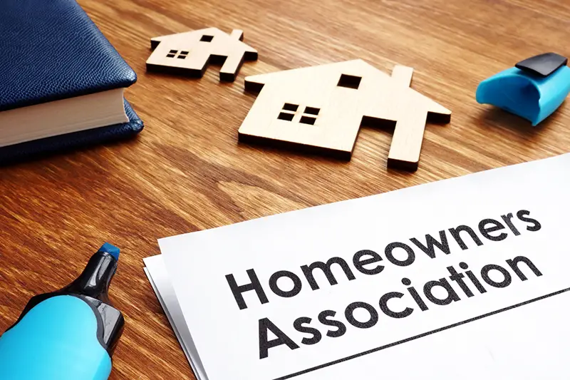 Documents about Homeowners Association HOA on a desk