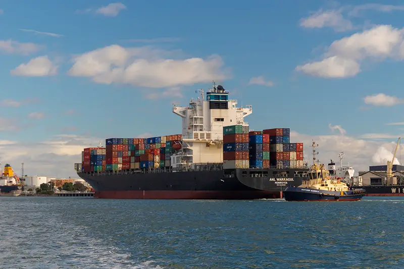 Cargo ship on sea during daytime