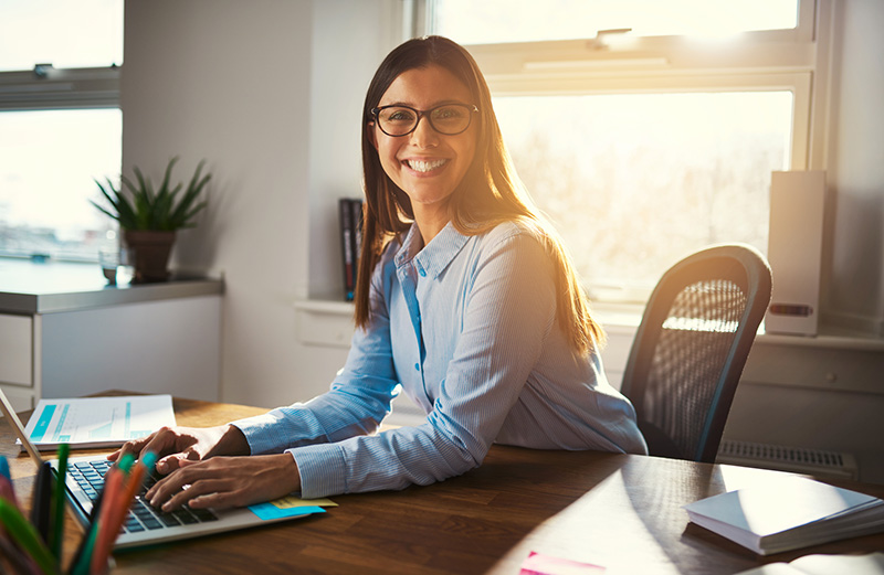 Young woman smiling working as assistant