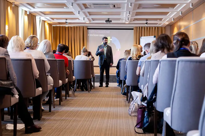 Man hosting a corporate events