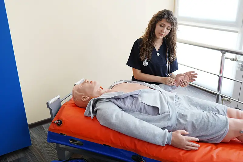 CPR training with CPR doll