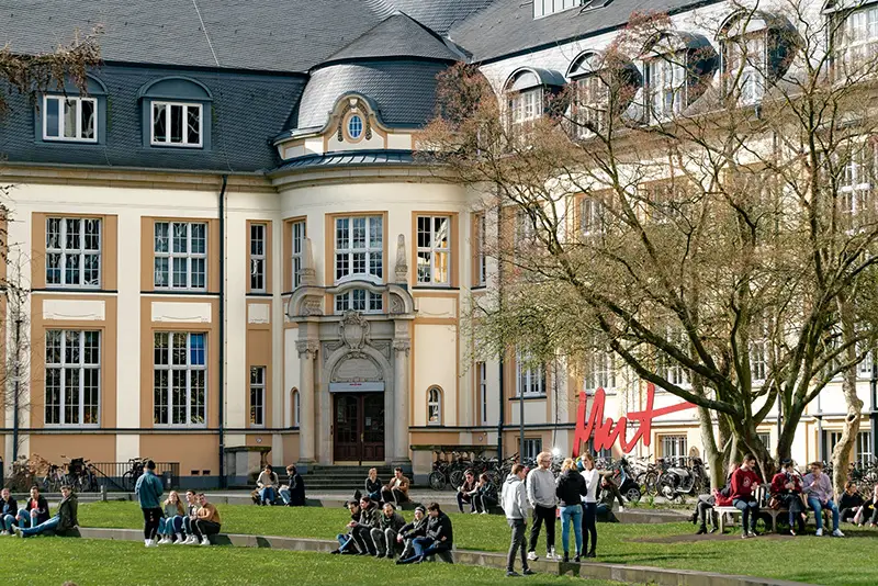 students in front of University campus