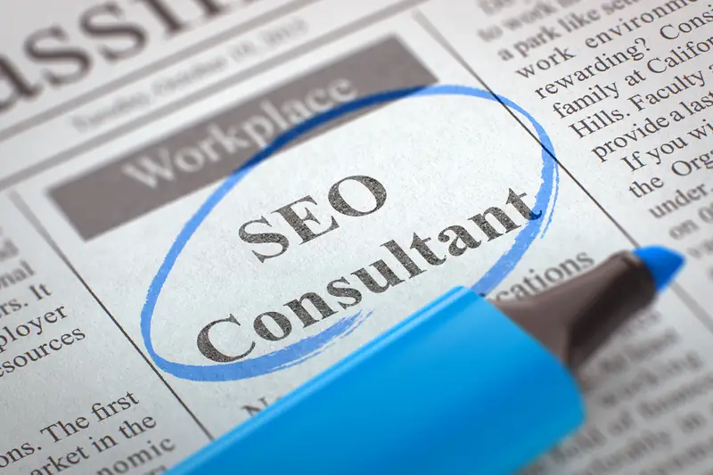 Newspaper with Small Ads of Job Search SEO Consultant