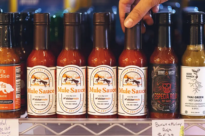 Hot sauce bottles with labels
