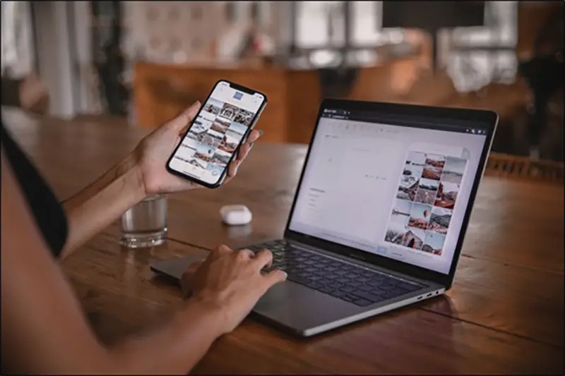 Woman Working on Laptop and Smartphone