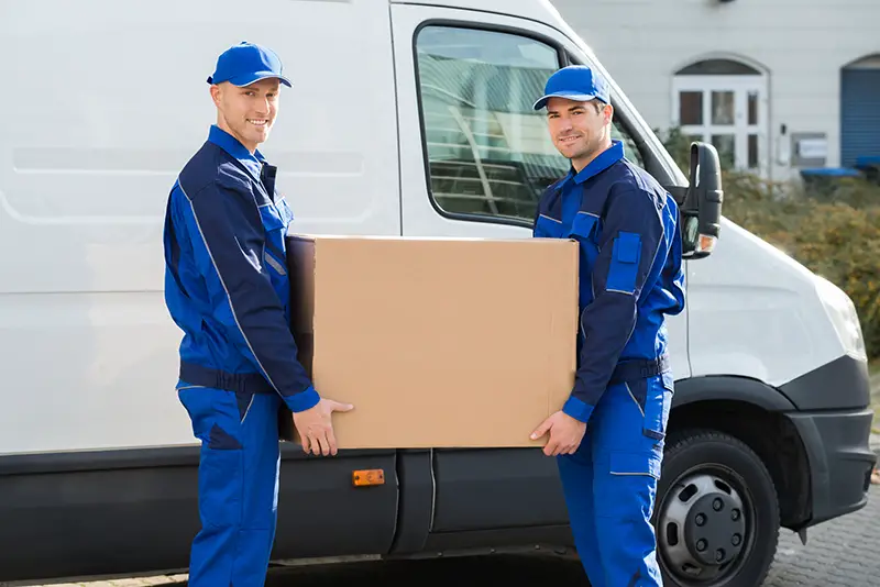 Delivery men carrying box