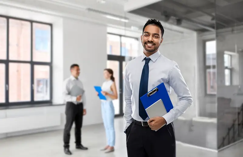 Insurance agent wearing long sleeves and tie