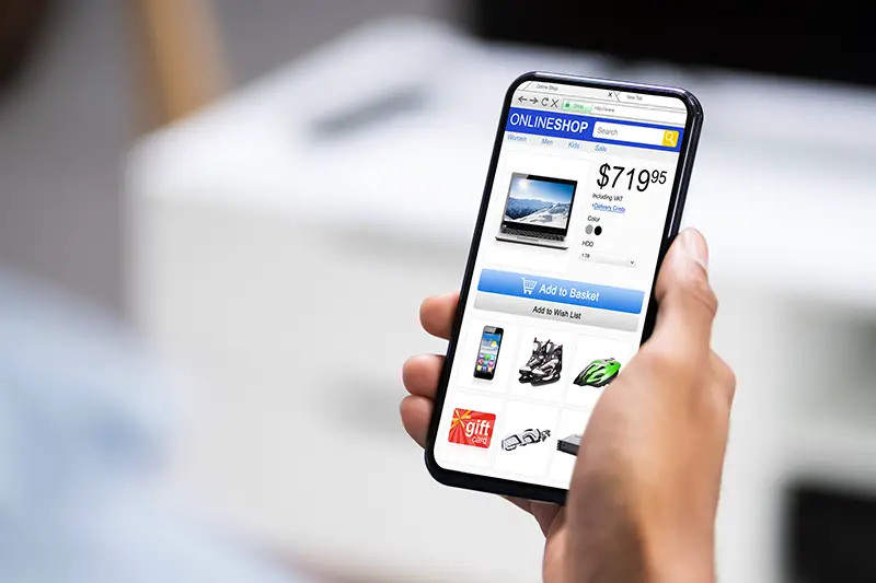 Person using mobile ecommerce apps
