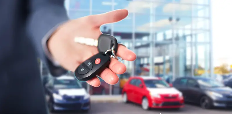 Person holding car key
