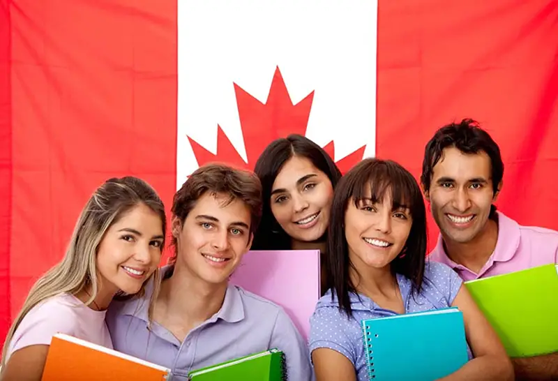 Group of University student  with Canadian flag on the back