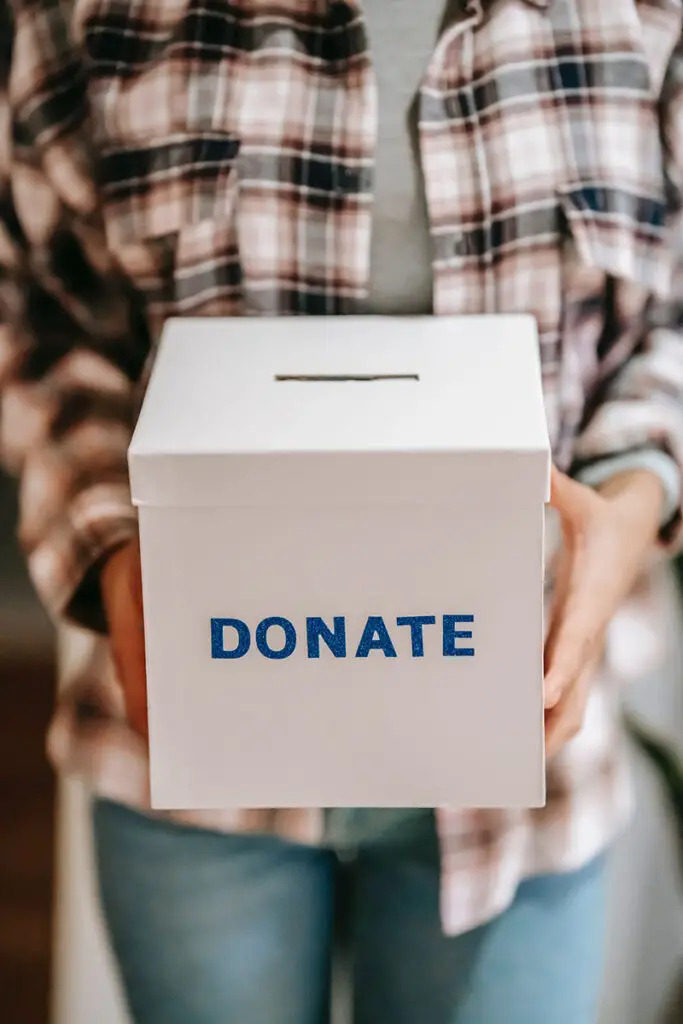 person showing donation box