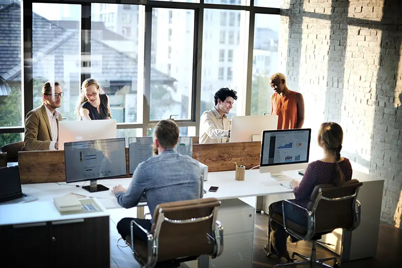 People working inside the office building