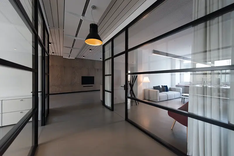 Room with glass wall divider