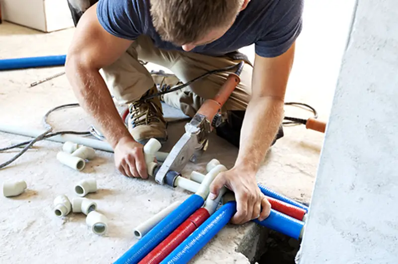 Man fixing the water pipeline