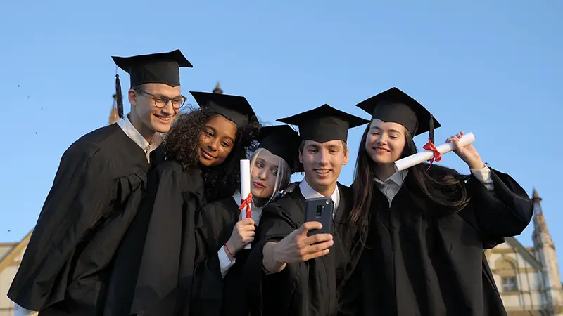 Group of students wearing graduation gown